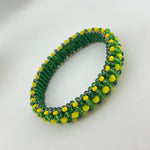 Orula Ilde | Woven Diamond Pattern - handmade Green & Yellow Protection Bracelet