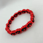 Elegua Ilde | flower pattern - Handmade Red and Black Spiritual Protection Bracelet