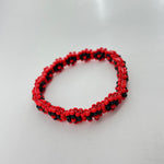 Elegua Ilde | flower pattern - Handmade Red and Black Spiritual Protection Bracelet