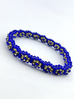Ochosi Ilde | flower pattern - Handmade blue & gold crystal beads Spiritual Protection Bracelet