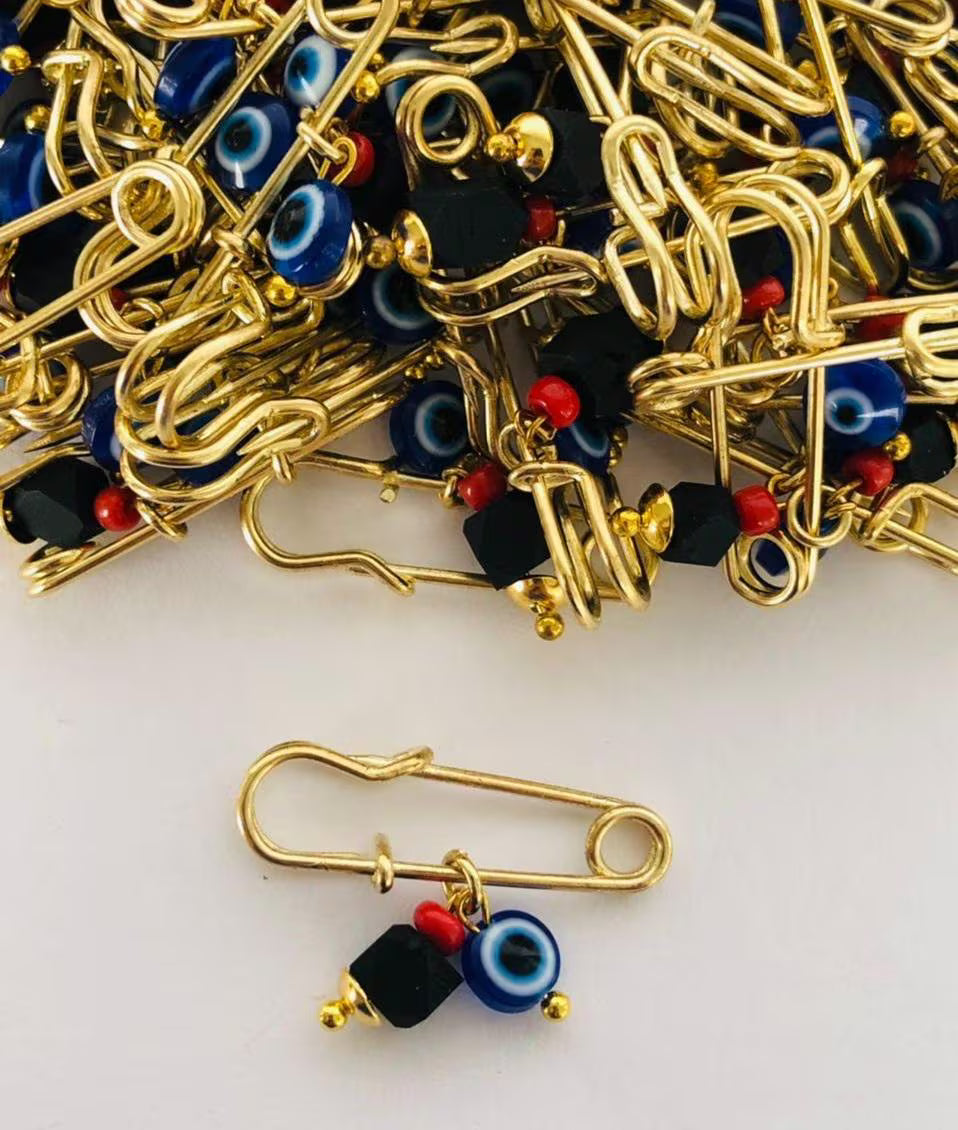 Baby Pin Azabache  y ojo turco azul  amuleto proteccion