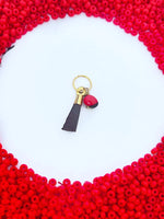 Proteccion azabache y peonía montada en gabuchòn dorado