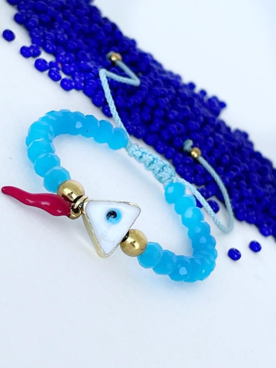 Pulsera con Ojo Turco Triangular Cachito de Coral y Balines dorados good luck